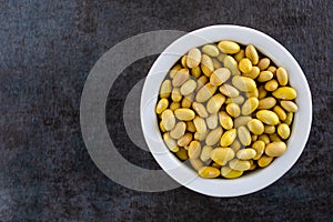 Organic Yellow Beans or Mayocoba Beans In White Bowl