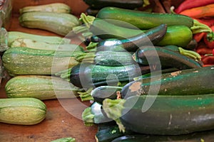 Organics green and yellow zucchini sold on city market