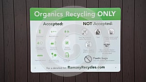 Organics recycling sign at collection site