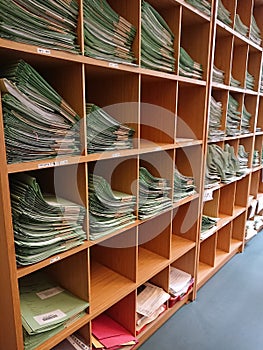 Organised file folders full of papers
