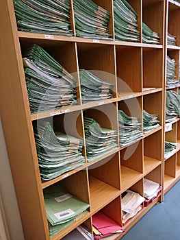 Organised file folders full of papers