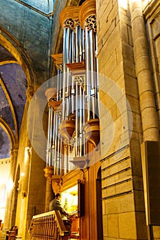 Organist playing on an old church organ