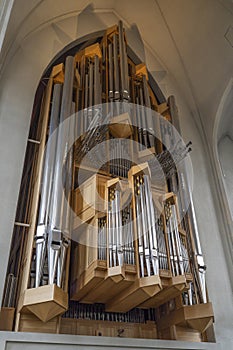 Organist plays music on church organ inside of Hallgrimskirkja