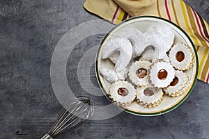 Oriental Algerian sweet cookies kaab el ghazal translated in gazelle horns name and cookies with apricot jam. photo