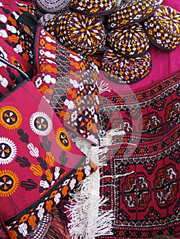 Oriental bazaar objects - bags, rugs and skull-cap