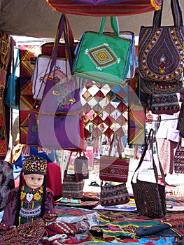 Oriental bazaar objects - doll and embroided bags