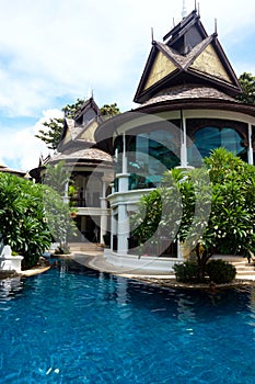 Oriental building near a pool