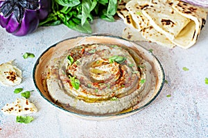 An oriental dish of baked eggplant babaganush eggplant puree