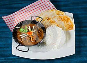 Oriental food - Indian takeaway at a London`s market