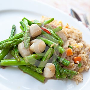 Oriental fried rice with asparagus and scallops.