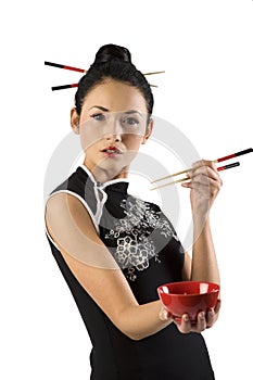 Oriental girl with chopstick