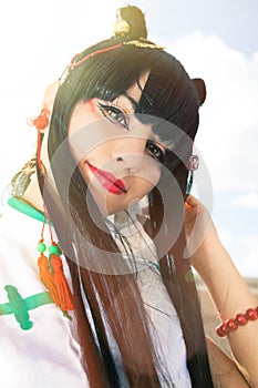 Oriental girl wearing makeup. Manga Cosplay