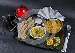 Oriental Indian set chicken korma naan bread, plate, coffee, d