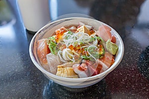 Oriental Japanese food, Bowl of mixed sashimi topped on Japanese