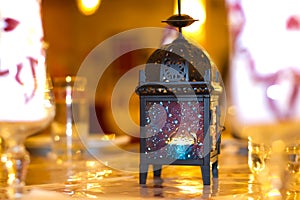 Oriental lamp with gloden background at wedding