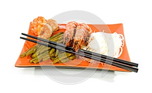 Oriental meal on orange plate