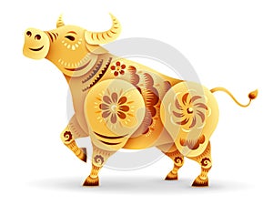 Oriental paper graphic cut art of golden ox symbol with floral pattern on white background . Isolated photo