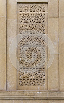 Oriental pattern on the stone wall