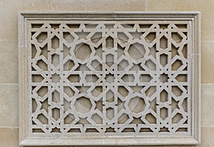 Oriental pattern on the stone wall