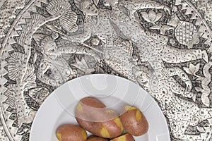 Oriental Silver Plate with potatoes