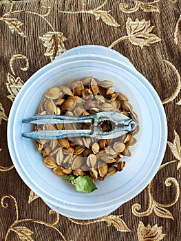 Oriental still life: apricot kernels