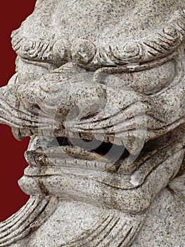 Oriental stone statue of a lions head