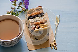 Oriental sweets, halva, sherbet with nuts. Sweet sherbet with nuts. Cup of tea with turkish sweets.