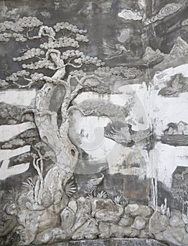 Oriental tree basrelief on wall