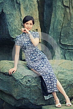 Oriental women wearing cheongsam