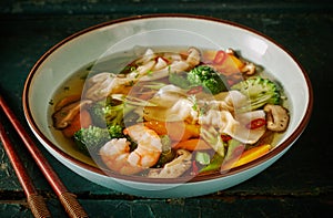 Oriental wonton soup with dumplings and shrimp