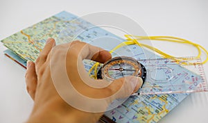 Orienteering Compass and Map with hand