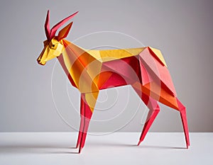 Origami antelope made of colored paper. Three-dimensional figurine