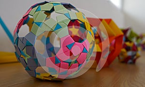 Origami ball and geometries
