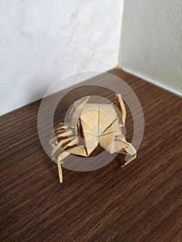 Origami paper folding art, crab