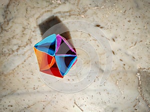 Origami Paper Pen Stand - Top View Background / Abstract