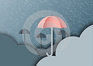 Origami umbrellas with clouds on monsoon background and rainy se