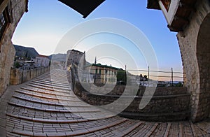 Mostar Bridge is a bridge over the river Neretva that passes through the city of Mostar in Bosnia and Herzegovina. photo