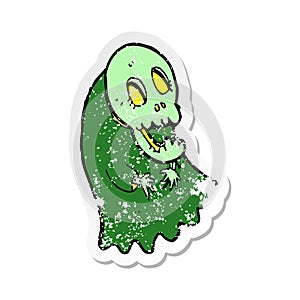 A creative retro distressed sticker of a cartoon spooky ghoul