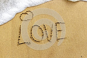 An original Declaration of love in the sand. Love on vacation. L