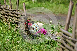 Original flowerbed with fence