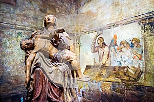 Santa Rosa, Misiones, Paraguay - Original frescos and wooden statue in the Jesuit Church in Santa Rosa photo