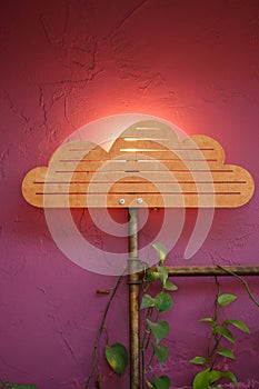 Original interior with wooden cloud and sun lamp