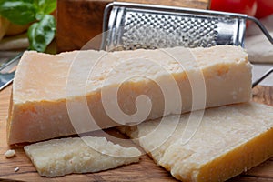 Original italian cheese, aged Parmesan cow milk cheese, pieces of Parmigiano-Reggiano