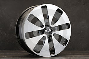 original KIA spare parts. new alloy wheels for car on dark background