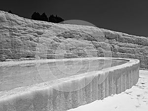 Original Pamukkale place in Turkey in Asia landscape with limestone pools with blue warm water