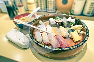 Original plate of sushi nigiri at japanese restaurant in Tokyo photo