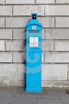 An original Police telephone free for use of public, on the streets of London.