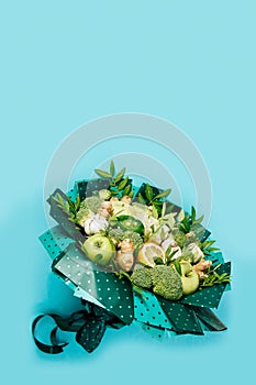 Original unusual edible gift bouquet from vegetables and fruits