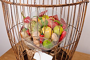 The original unusual edible vegetable and fruit bouquet with card in bird cage