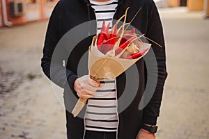 The original unusual edible vegetable and fruit bouquet man hands